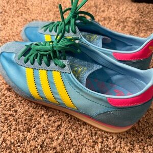 adidas Women’s Light Blue Sneakers with Yellow Stripes and Green Laces